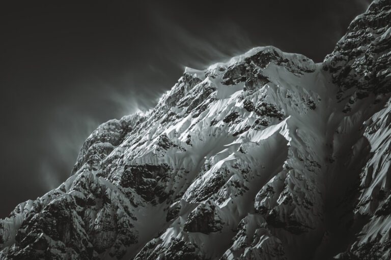 Snowstorm blowing over the Hochkalter peak in the Nationalpark of Berchtesgaden